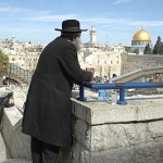 An Orthodox Jewish man looks over the Western (Wailing) Wall plaza in the Old City of Jerusalem