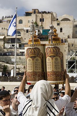 Lifting the Sefer Torah tik in Jerusalem so all can see the Holy Scripture contained on the scroll that is protected inside.