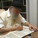 A Jewish scribe-Torah scroll