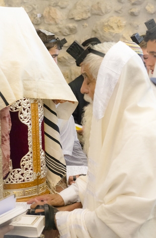 Jewish man-Tefillin-Phylacteries-Mincha-Western Wall-Jerusalem-Tisha B'Av