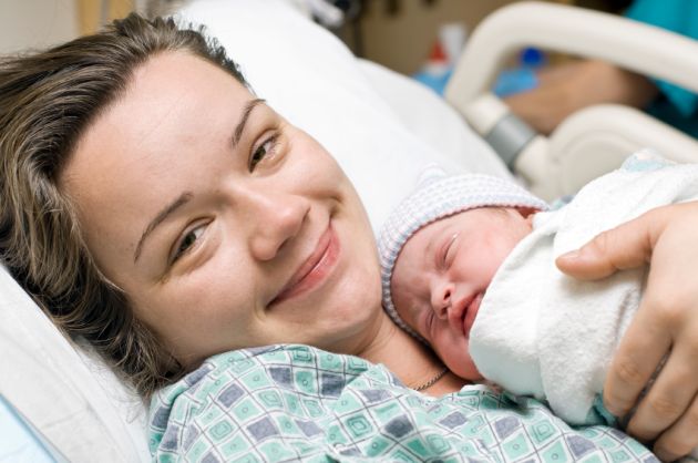 Happy mother-newborn baby