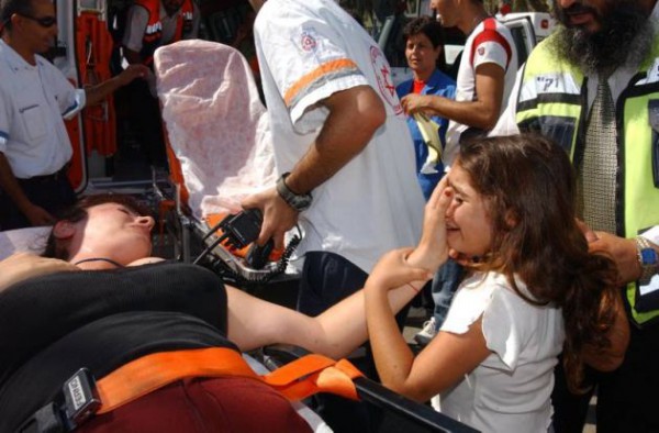 Sderot-injured mother-upset Israeli child-Gazan rocket attack