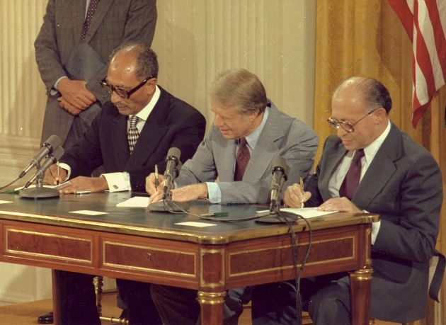 Anwar Sadat, Jimmy Carter and Menahem Begin at the Camp David Accords Signing Ceremony Begin-Carter-Sadat-Camp David-Signing Ceremony
