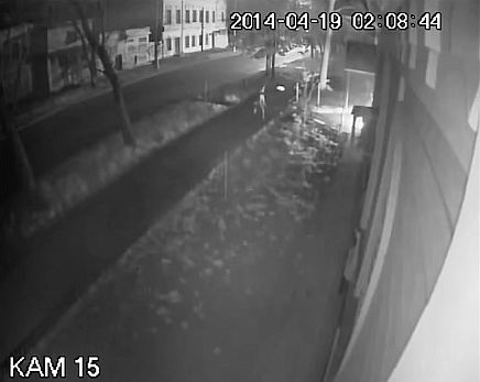 An infrared security camera records the firebomb attack.