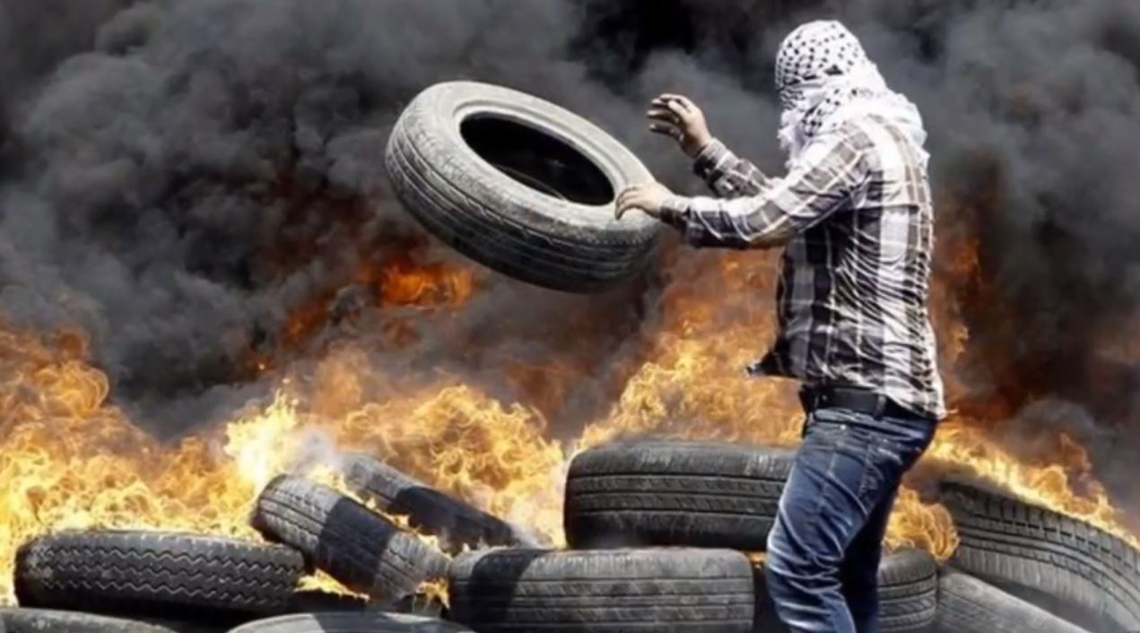 Palestinian-protest-burning tires-Abu Khadair