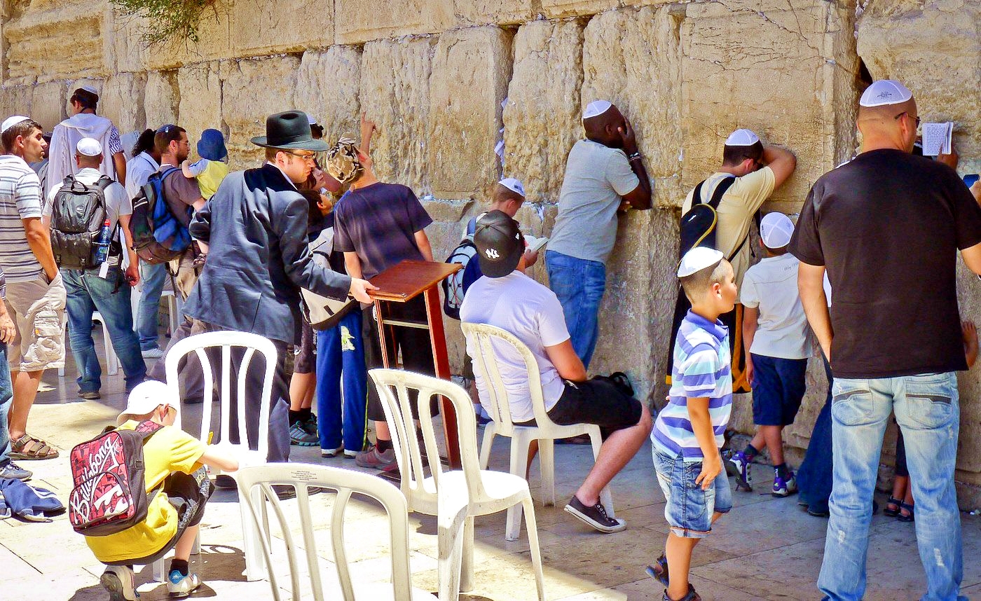 pray Western Wailing Wall Plaza Jerusalem.