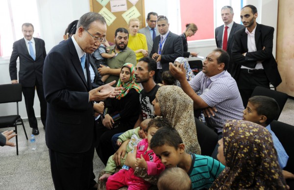 Secretary-General Ban Ki-moon (second from left) meets with internally displaced persons (IDPs) during his visit to the Gaza Strip.