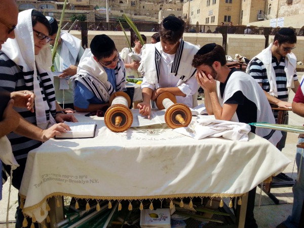 Reading from the Torah scroll on Sukkot