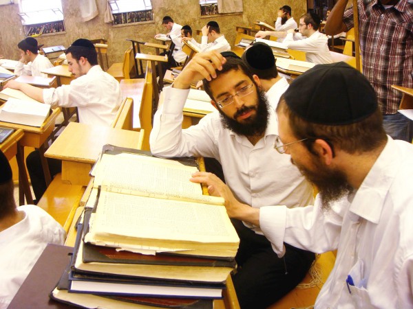 Yeshiva (Orthodox seminary) students in Jerusalem discuss Torah.