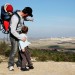 An Israeli father points out the family's hometown during a hike.