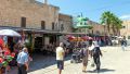 People of many ethnicities on a street in Acre, Israel