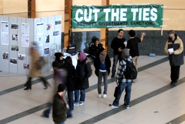 A banner at Toronto's York University in Toronto tells passersby to end their "support for Israeli Apartheid: cut the ties: boycott, divestments, sanctions."