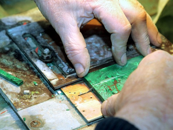 Cutting malachite, which has been mined and smelted in Israel's Timna Valley for over 3,000 years.