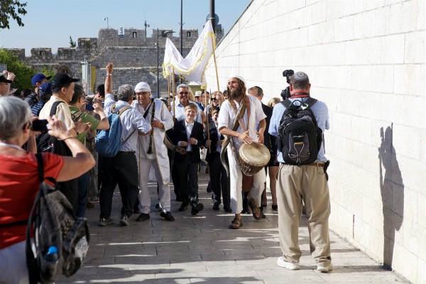 A Bar Mitzvah procession at the Western (Wailing) Wall in Jerusalem, a popular spot to be Bar Mitzvahed for men of all ages.