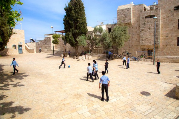 Israeli Jewish children play soccer in Jerusalem