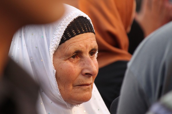 Palestinian woman sheds a tear