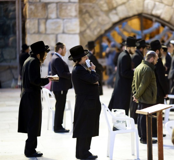 Jewish men pray at the Western (Wailing) Wall in Jerusalem.