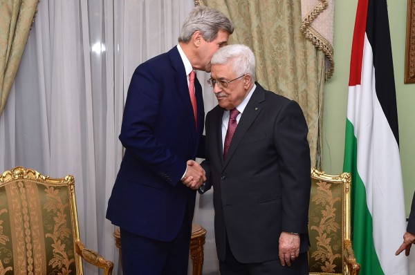 Kerry and Abbas share a private moment in Cairo. (October 12, 2014)