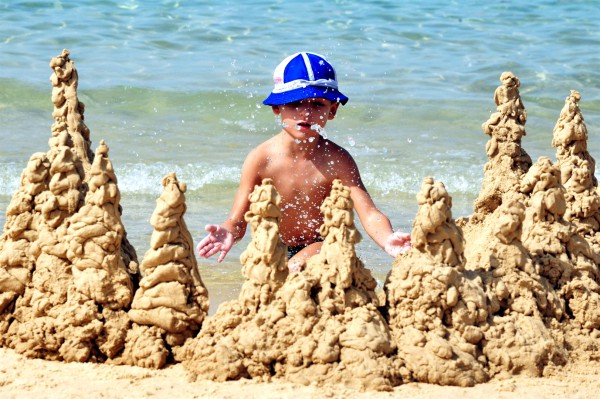 An Israeli boy makes sandcastles on the Mediterranean Sea.