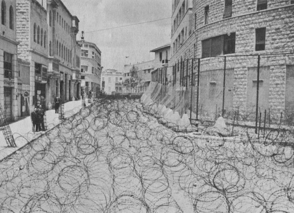 Between 1946 and 1948, the British Mandatory administration used barbed wire to secure and fortify key British installations, preventing Jewish and Arab movement. On Friday, May 14, 1948, the British Mandate ended and British forces withdrew. Israeli Irgun forces quickly took control of buildings that the British had nationalized.