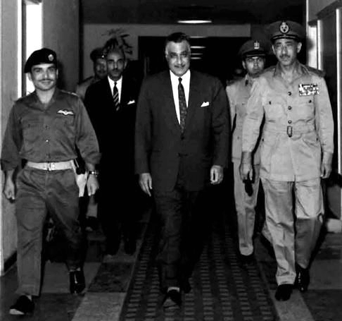 Nasser (center), King Hussein of Jordan (left) and Egyptian Army Chief of Staff Abdel Hakim Amer (right) at the Supreme Command of the Armed Forces headquarters in Cairo before signing a mutual defense pact, 30 May 1967.