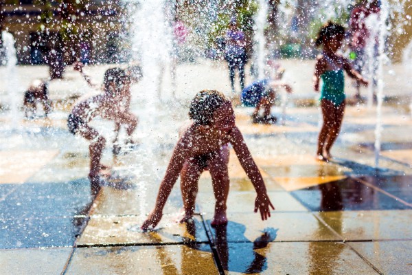 Children play in a Tel Aviv fountain.