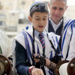 A young man has his Bar Mitzvah (Son of the Commandment) in Jerusalem. (Ministry of Tourism photo by Jonathan Sindel)