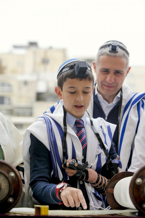 A young man has his Bar Mitzvah (Son of the Commandment) in Jerusalem. (Ministry of Tourism photo by Jonathan Sindel)