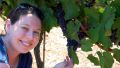 Woman in an Israeli vineyard (photo by Eli Brody)