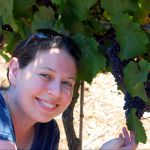 Woman in an Israeli vineyard (photo by Eli Brody)