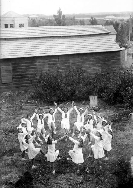 Girls wearing white dance on Tu B'Av in the Holy Land.