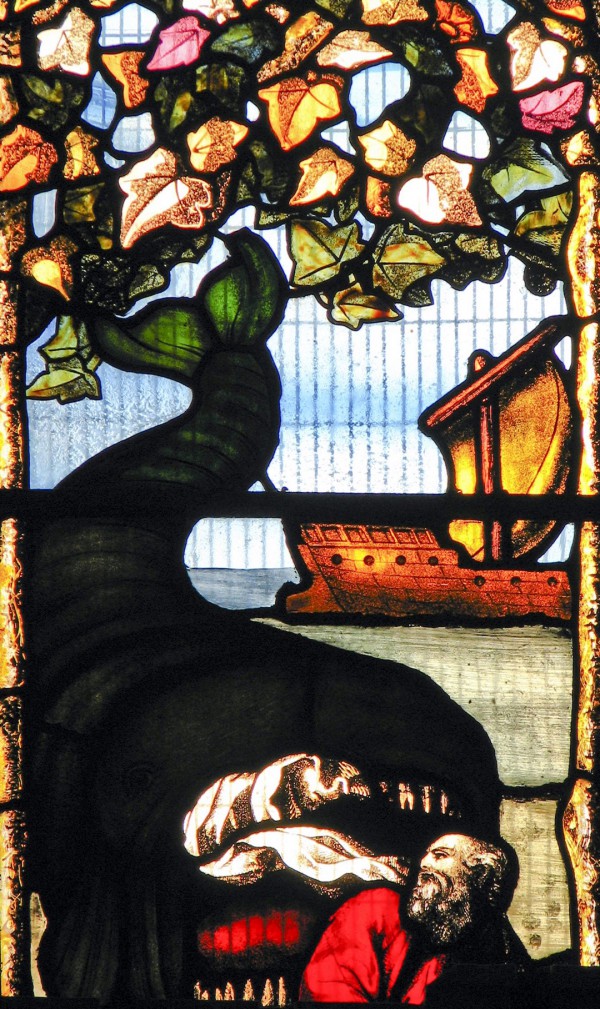 Jonah and the whale as depicted on a stained glass window in Oxford's Jesus College (photo by Fr. Lawrence Lew)