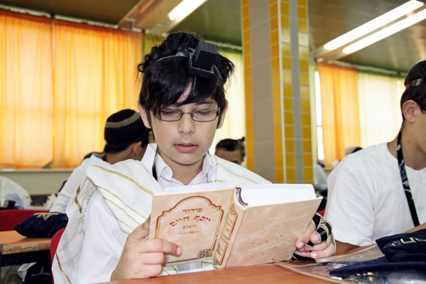 Jewish student-Siddur-tefillin-tallit