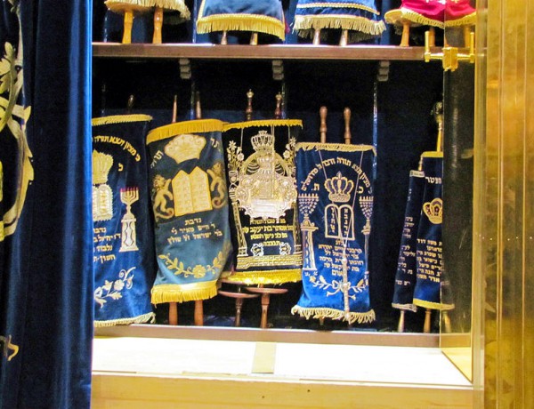 Torah scrolls are housed in a synagogue's Aron Kodesh (Torah ark).