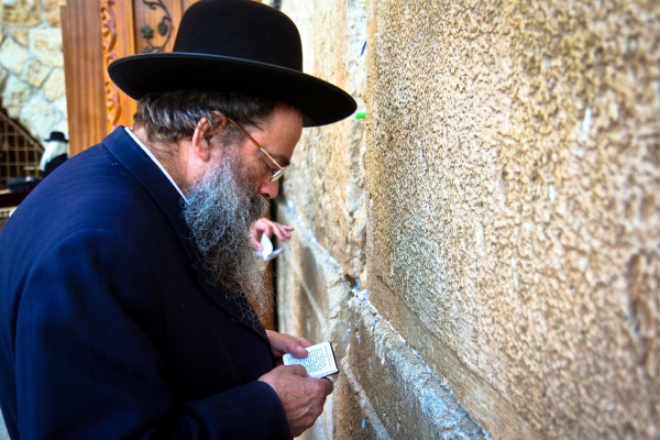 An ultra-Orthodox Jewish man prays at the Western (Wailing) Wall.