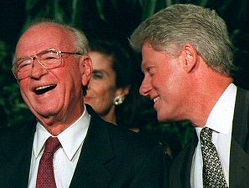 Yitzhak Rabin shares a laugh with US President Bill Clinton.