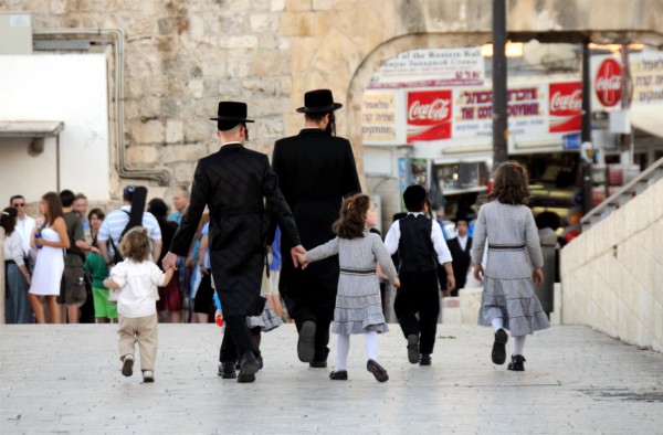 A Jewish family walks together in Jerusalem.