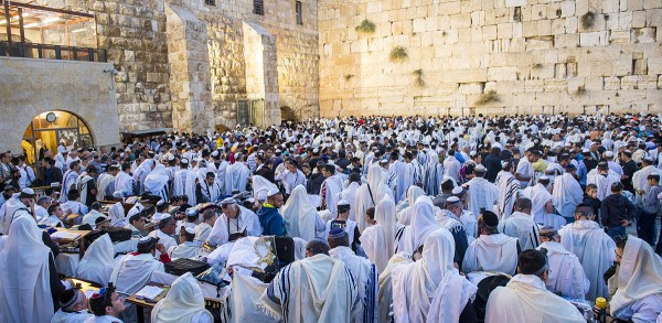 Jewish men gather at the Western (Wailing) Wall for prayer.