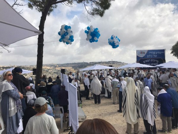 Rabbis, singers, and dancers (Jewish and Gentile) gather on the Jerusalem promenade overlooking the Temple Mount and the Mount of Olives to sing the Hallel psalms, acknowledging the God of Israel and all that He has done in restoring His Land and People.